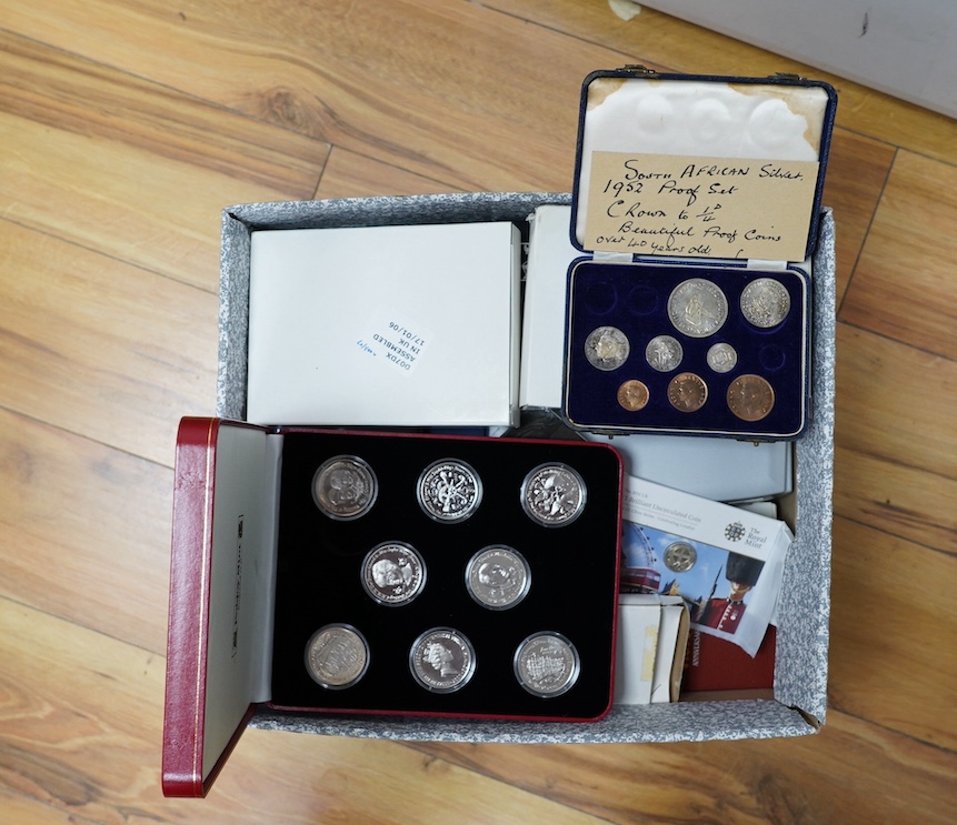 A large collection of Royal Mint boxed coins. Condition - fair